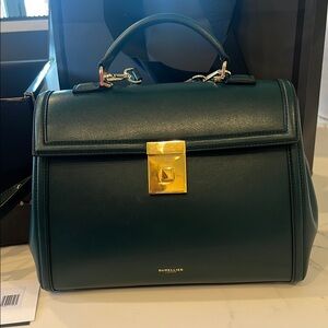 Demellier The Midi Paris handbag in smooth green leather